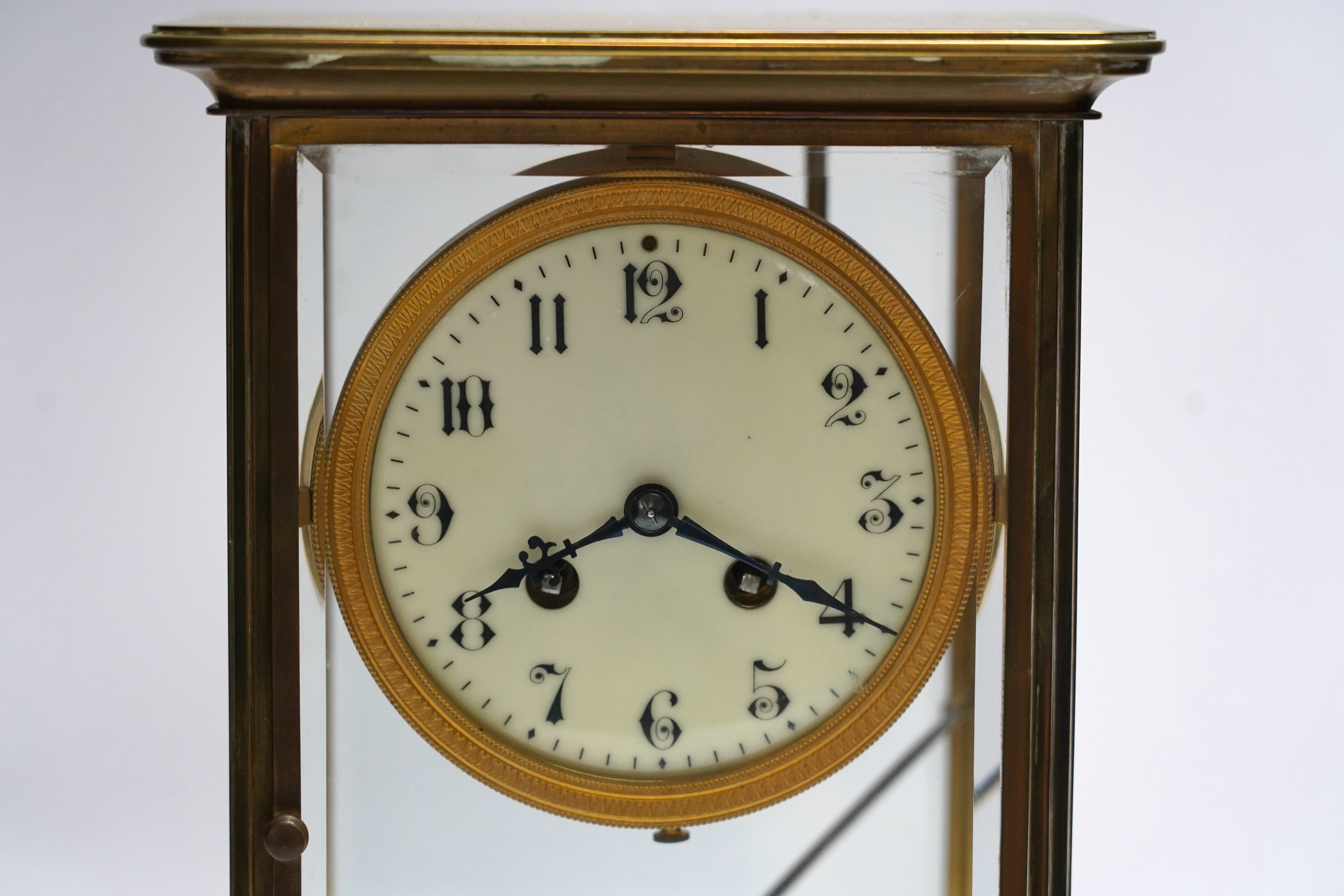 A French four glass mantel clock with mercury suspension and pendulum, 33cm